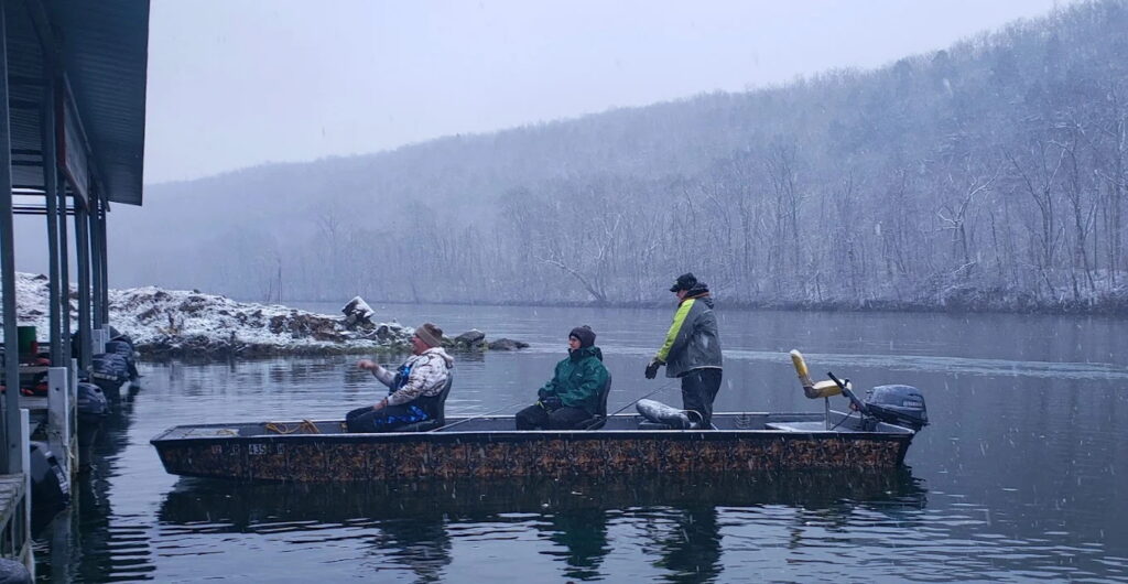 a spin and bait guide returning to the white hole resort dock after a day of guided fishing