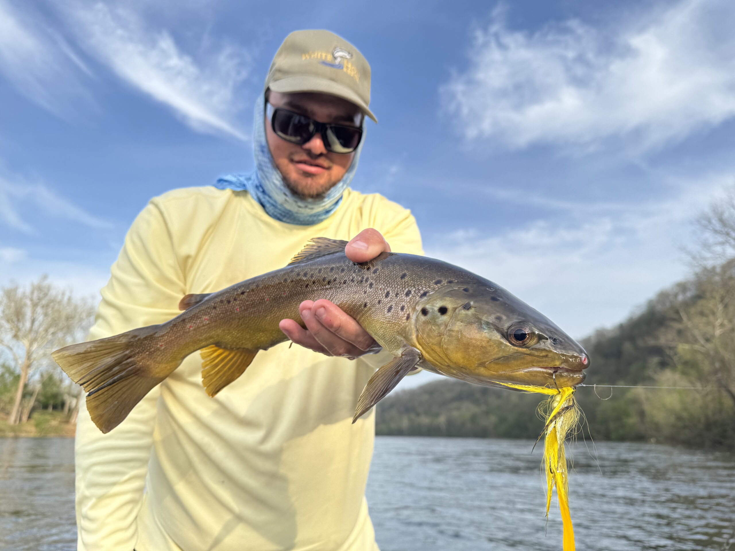 White Hole Resort Fly Fishing Guide James with Brown Trout