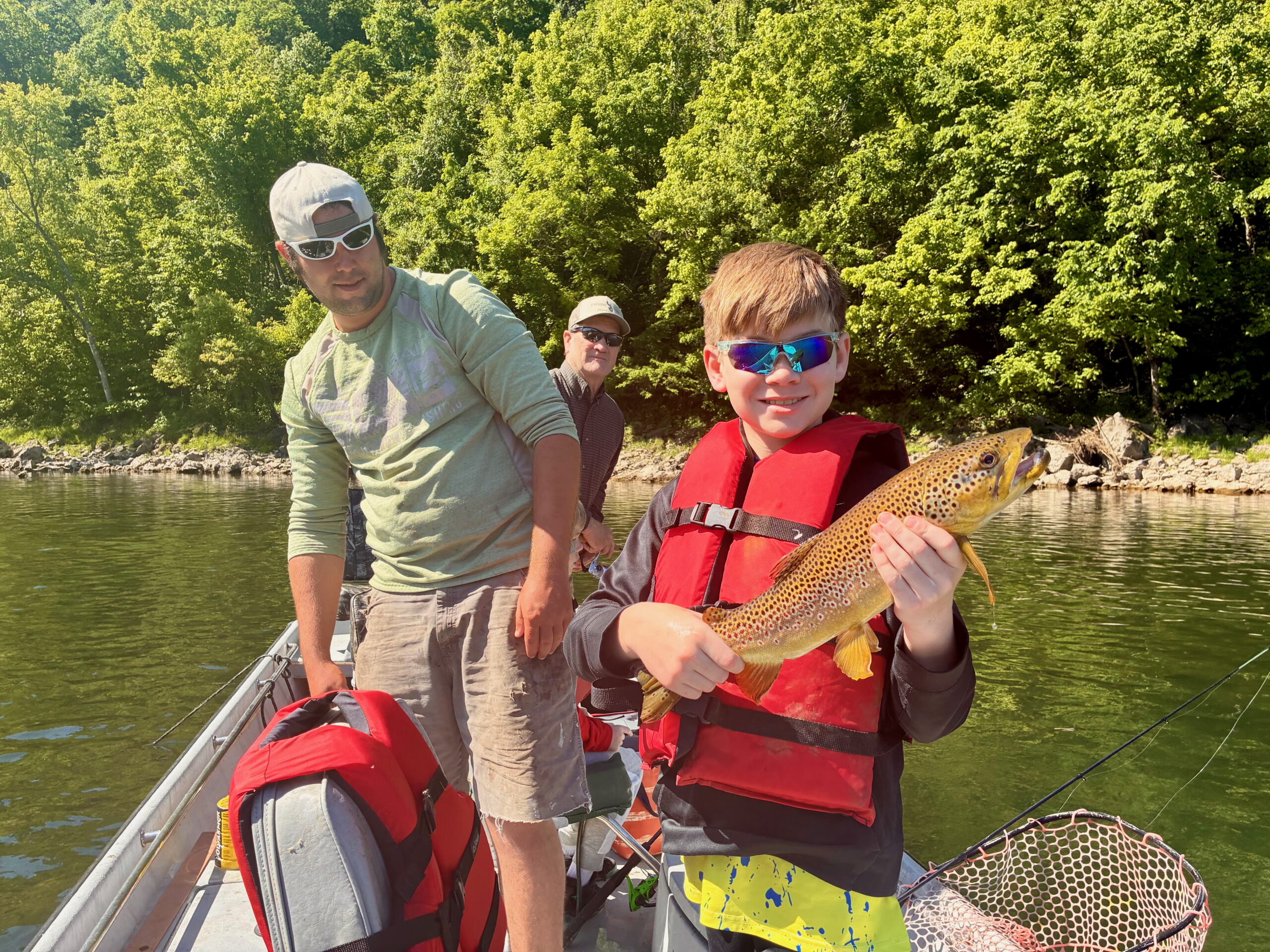 Children fishing for trout in late may on the White River