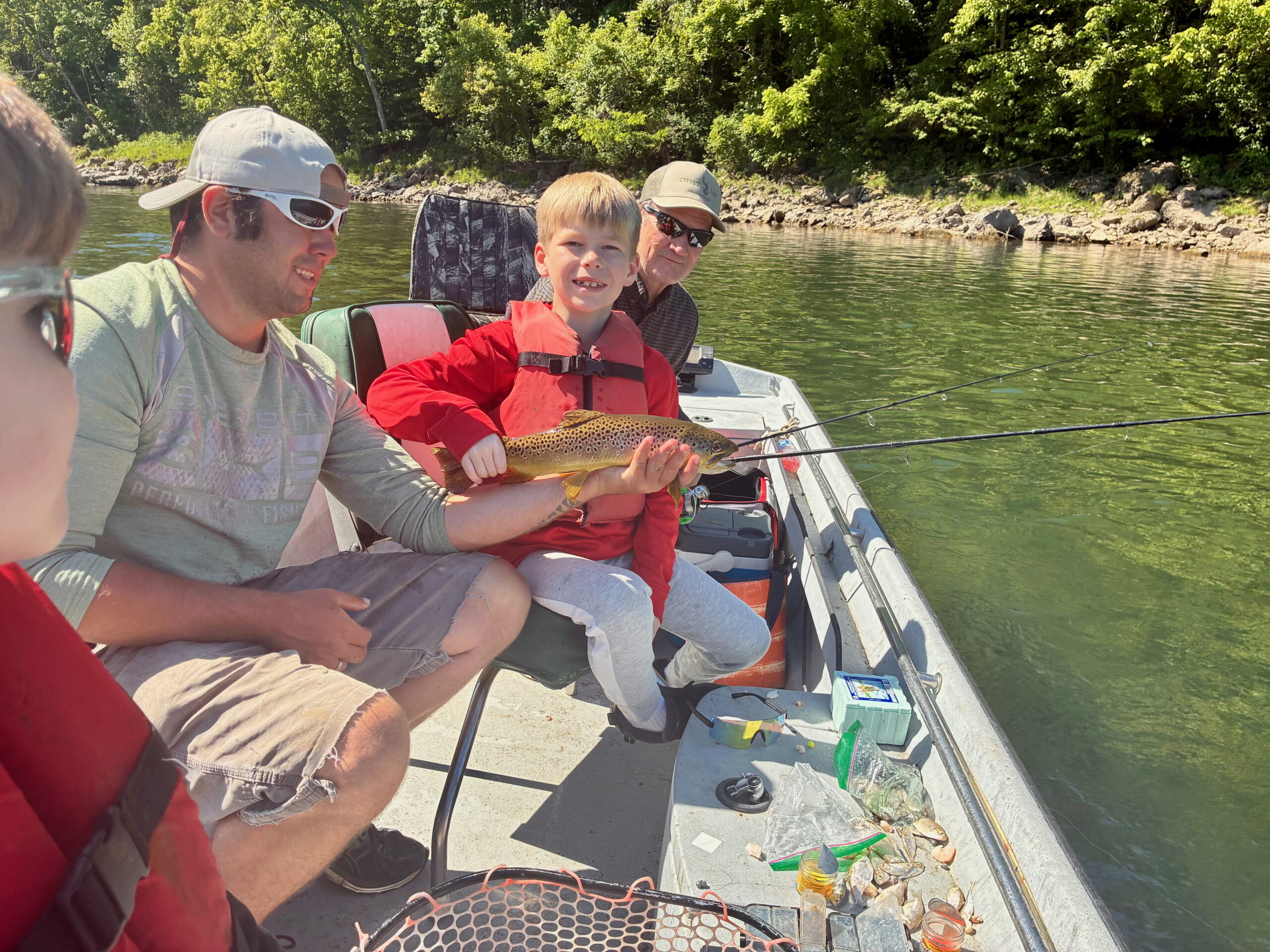 Children fishing for trout in late may on the White River