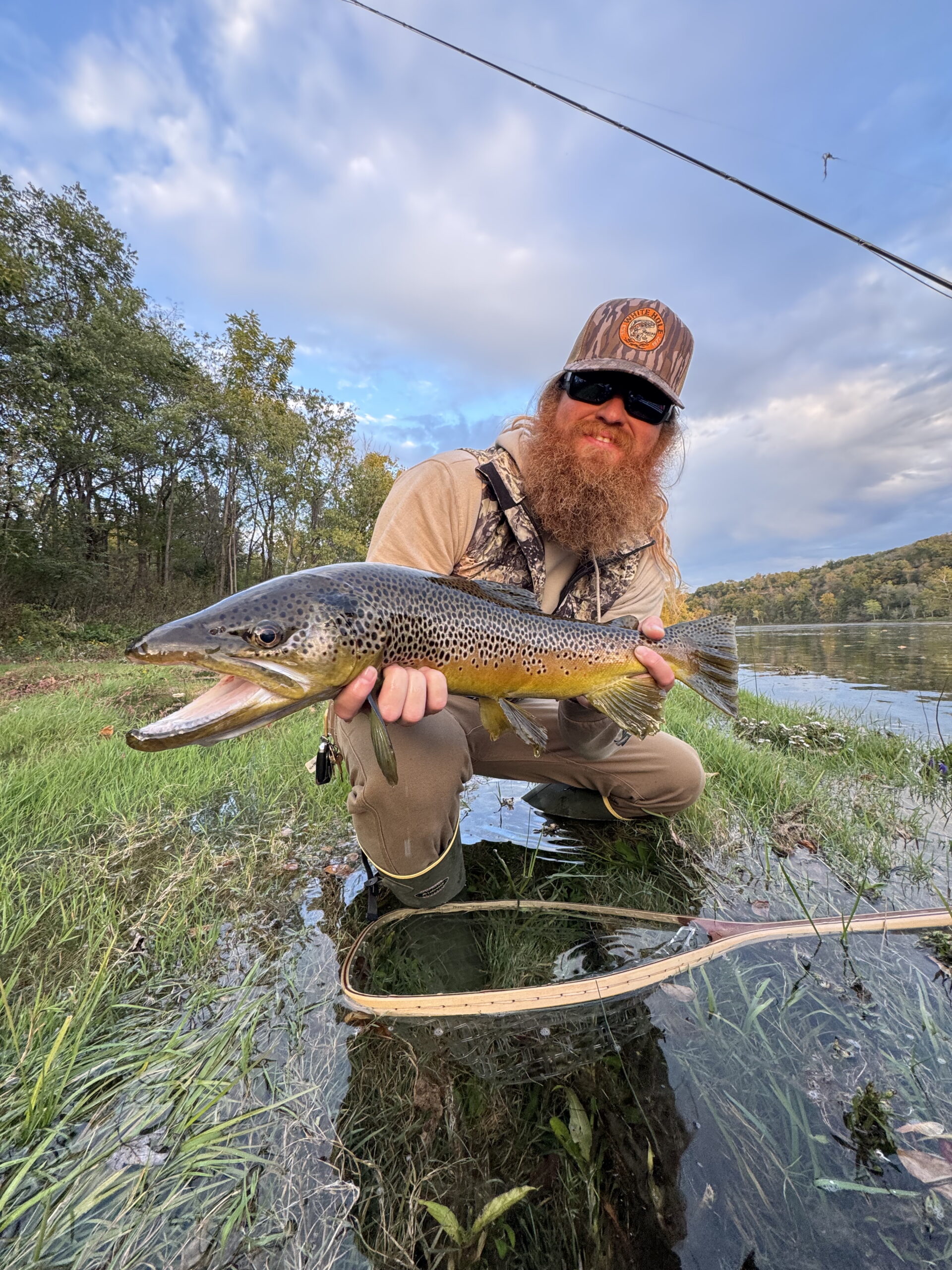 Captain Bailey Short with Brown Trout he Caught in Winter 2026 on the White River in Arkansas